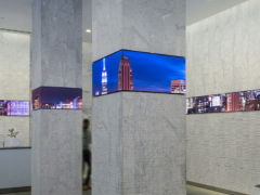Elegant New York Lobby Update with High-Tech Media Architecture and Data Visualizations